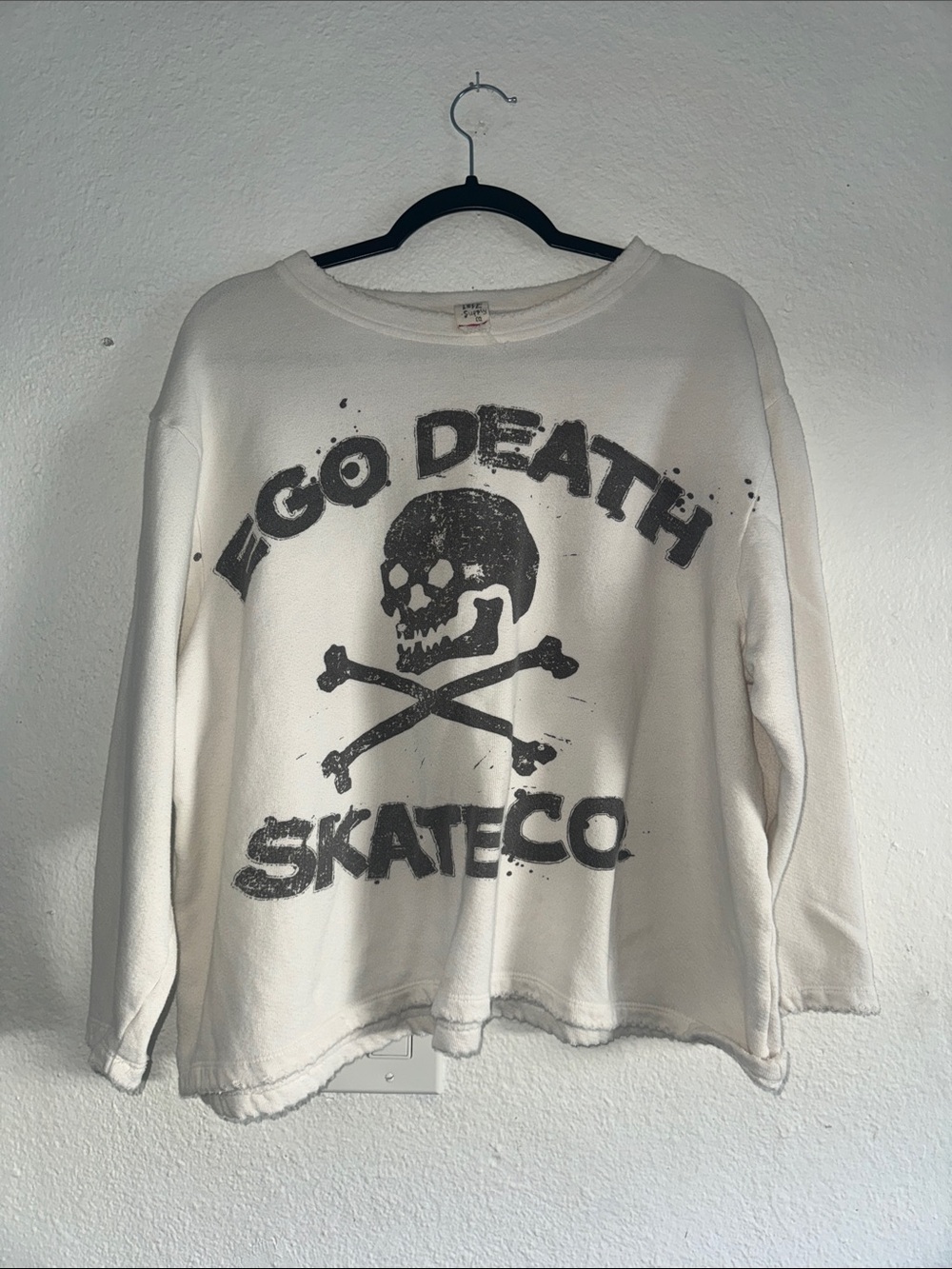 Magnolia Pearl White Crewneck Sweatshirt with Black Skull Graphic